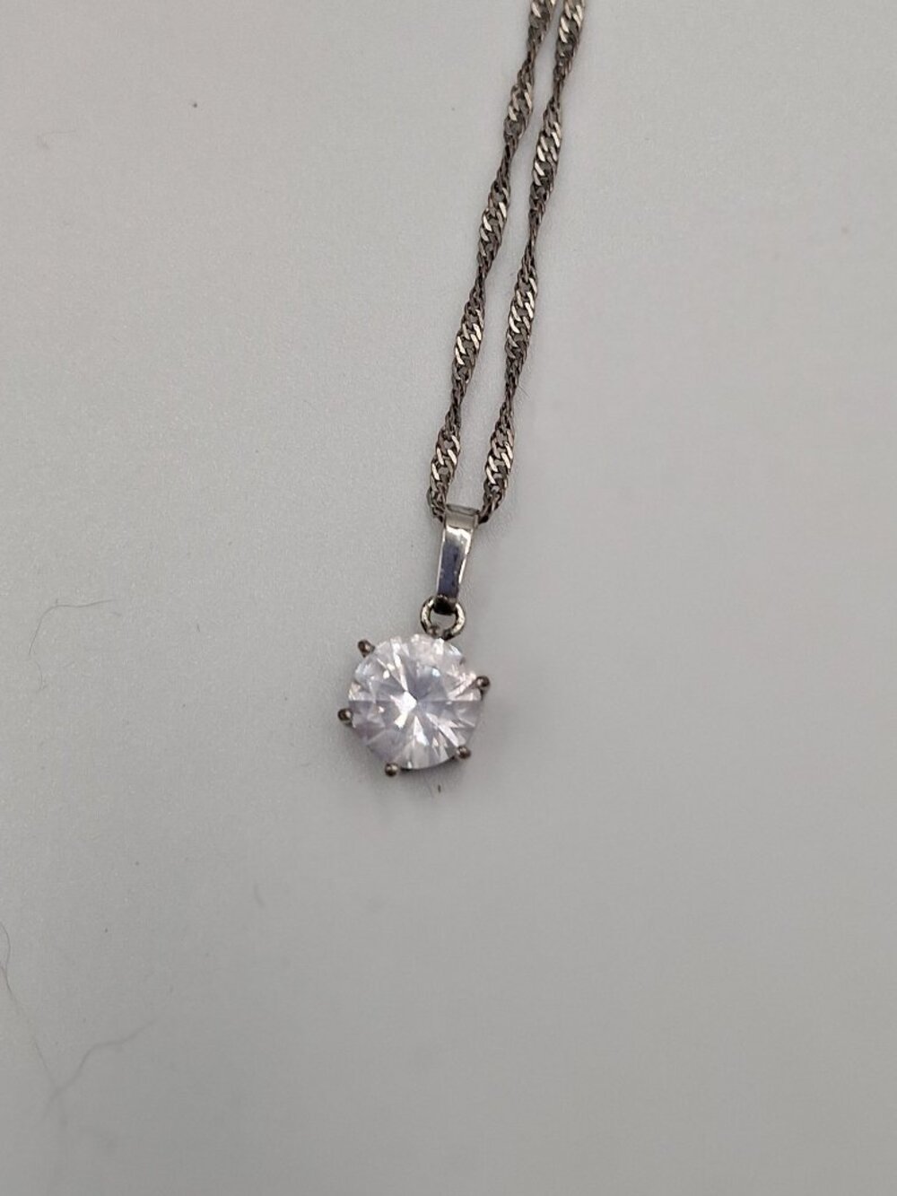 Round Clear stone pendant and silver chain necklace